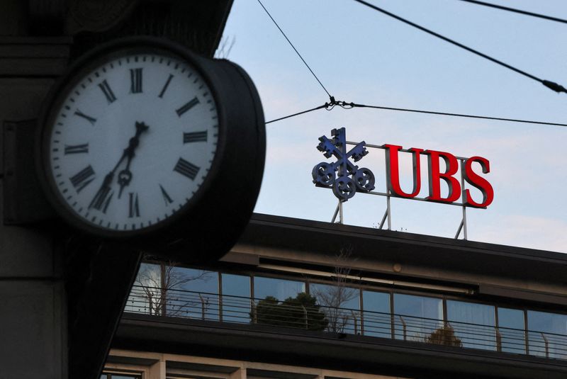 FILE PHOTO: A logo of the Swiss bank UBS is seen on the Paradeplatz in Zurich